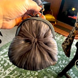 Vintage 70’s mini bag.with hand held strap.beautiful material perfect condition